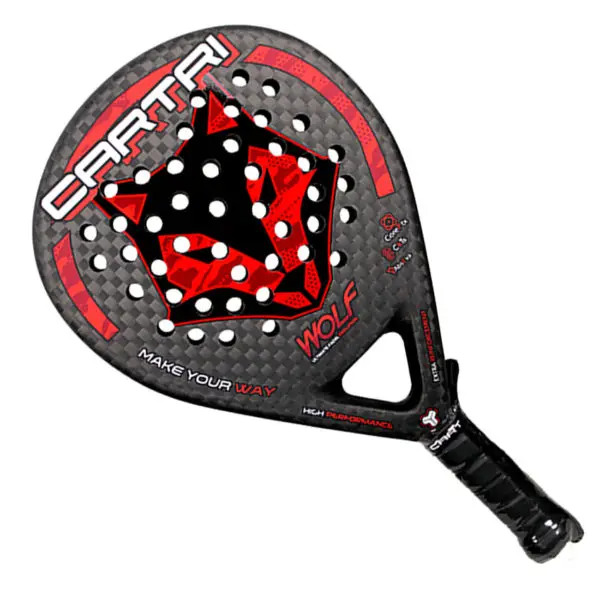 Group of people playing paddle tennis in a picturesque outdoor setting