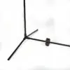 A close-up of a racket with a taut net in a paddelshack store.