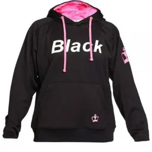 Two people playing padel tennis on a sunny day