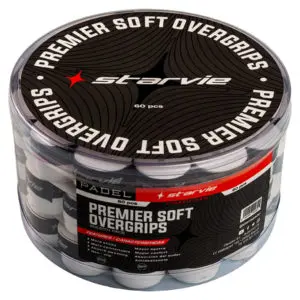 Group of happy friends playing padel tennis at an outdoor court