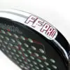 Two people playing padel tennis on a sunny day